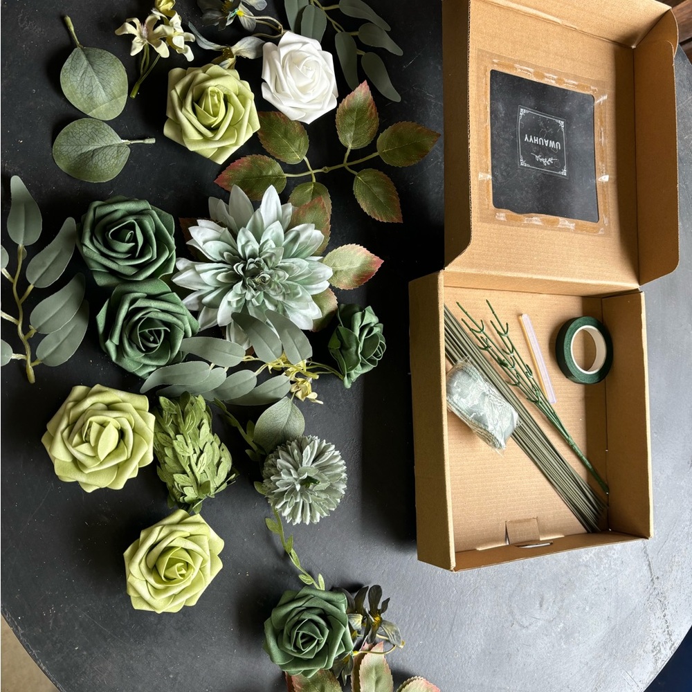 Green and White Party Decorations with Roses and Succulents